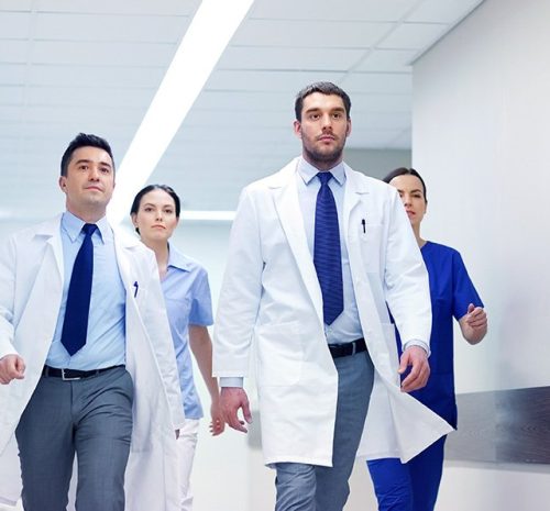 group-of-medics-walking-along-hospital-P92EJ7V-1.jpg